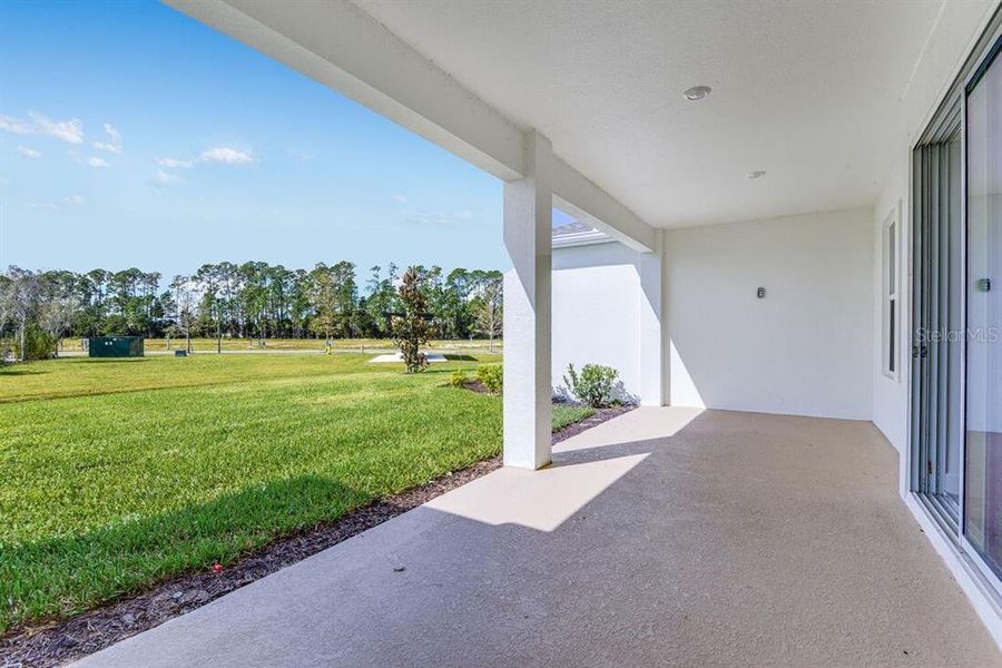 Exterior details and patio area of a home in Ardisia Park, New Smyrna Beach (Image 23).