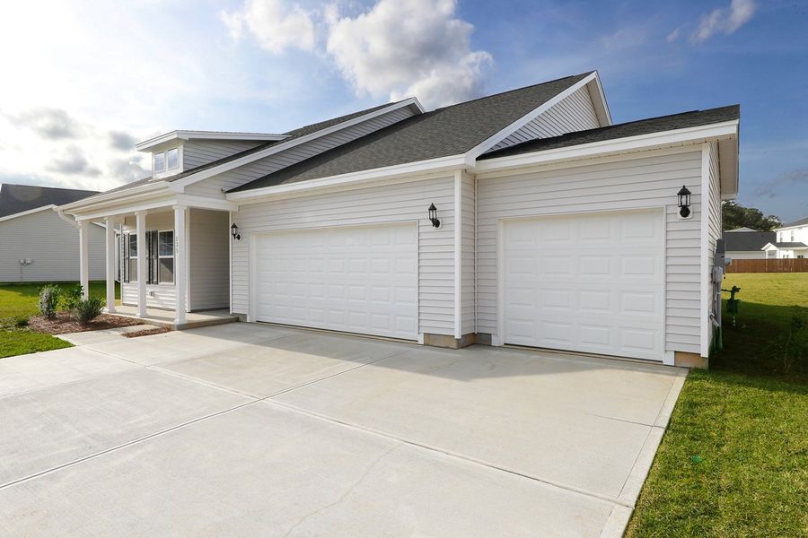 Front exterior of a new home in Garden Grove, Conway, SC, highlighting curb appeal (Image 21).