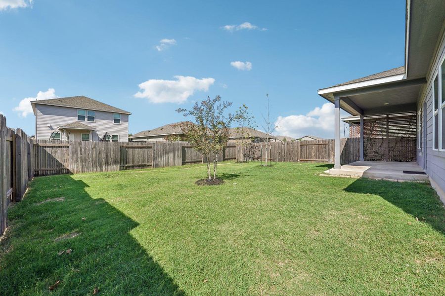 Exterior details and patio area of a home in Waterstone Crossing, Kyle (Image 3).