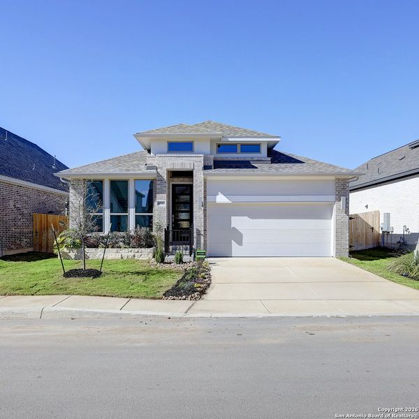Front exterior of a new home in Kallison Ranch, San Antonio, TX, highlighting curb appeal (Image 2).
