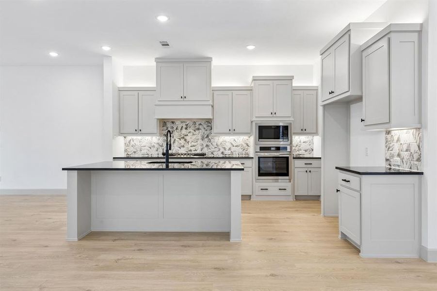 Your fantastic new kitchen features an oversized island perfect for friends and family to gather round!