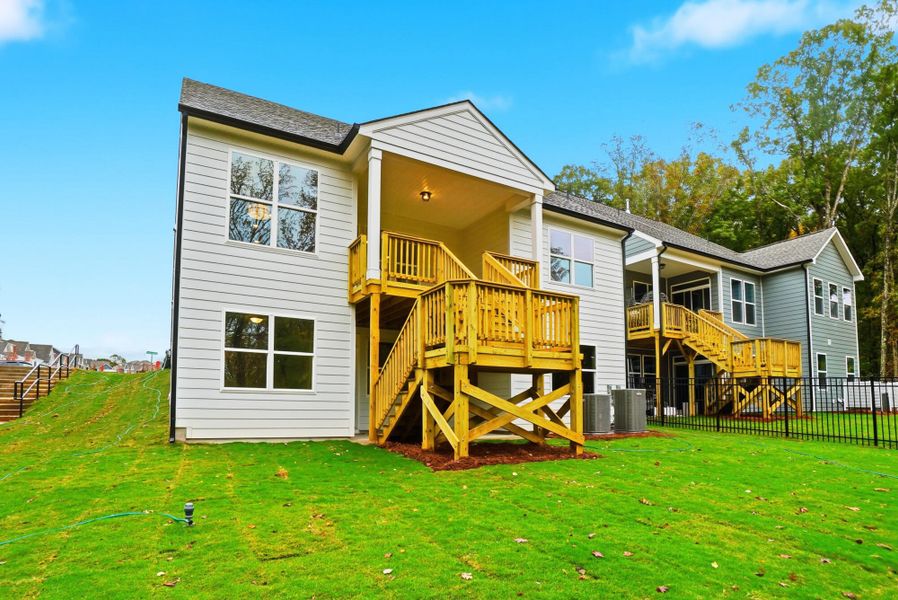 Exterior details and patio area of a home in Villas at Prestwick, Mooresville (Image 23).