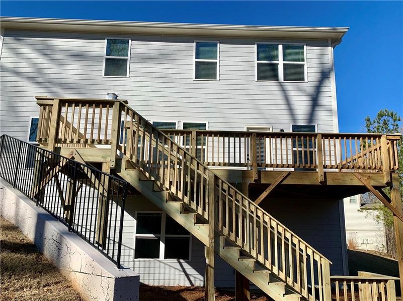 Exterior details and patio area of a home in Reunion, Hoschton (Image 24).