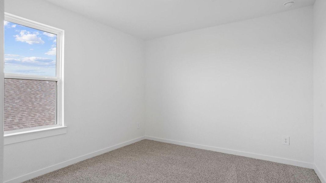 Spacious, unfurnished interior of a new home in Caldwell Crossing, Iowa Colony (Image 18).