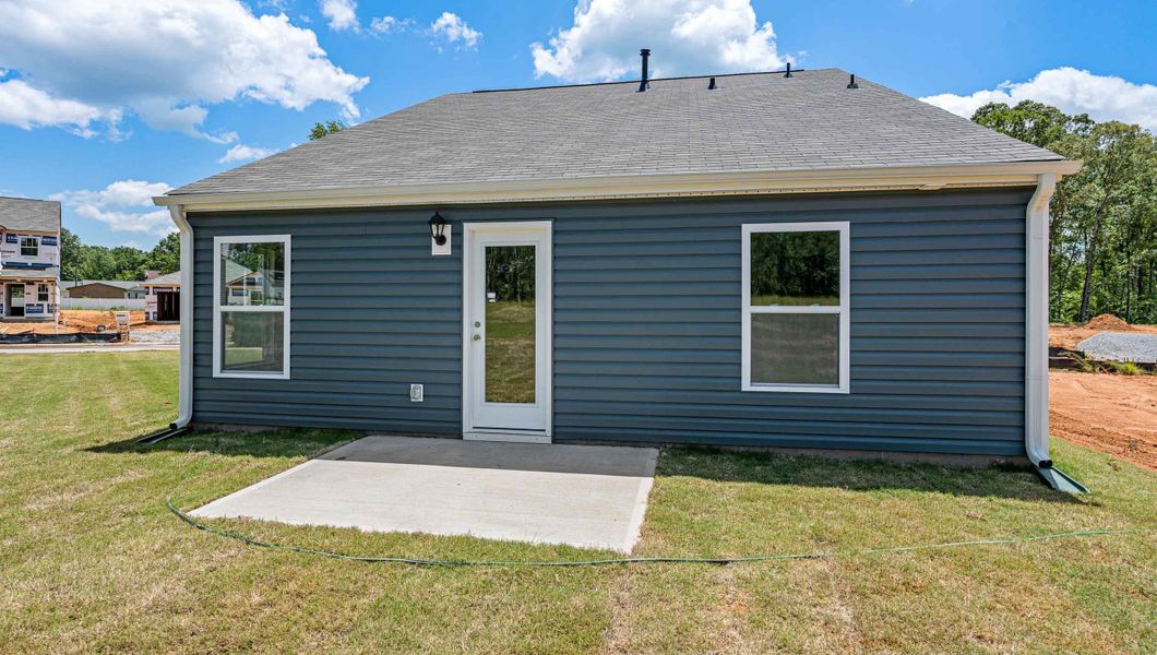 Exterior details and patio area of a home in Village Grove, Greenville (Image 2). Exterior details and patio area of a home in Village Grove, Greenville (Image 2).
