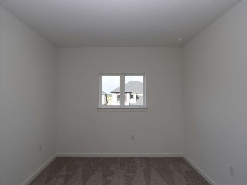 Spacious, unfurnished interior of a new home in Estancia West, Manchaca (Image 29).