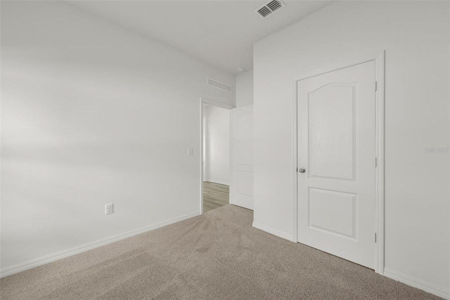Spacious, unfurnished interior of a new home in Peach Crossings, Winter Haven (Image 19).