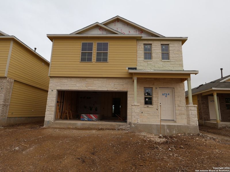 In-progress construction of a new home in Winding Brook, San Antonio, TX (Image 34).