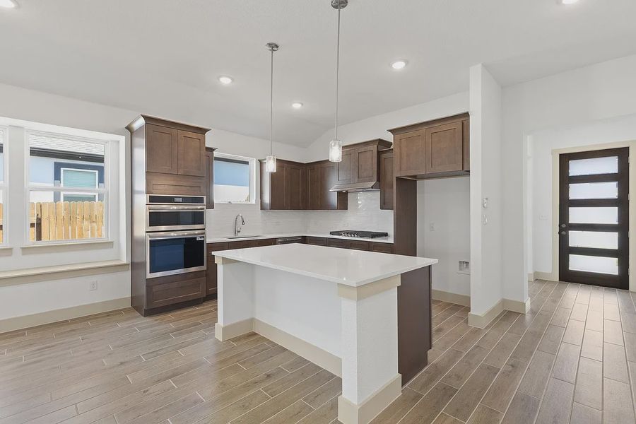 Furnished interior view inside a new home in Enclave at Cele, Pflugerville (Image 9).