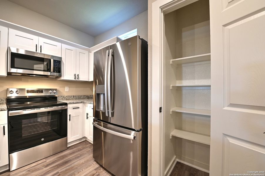 Furnished interior view inside a new home in , San Antonio (Image 13).