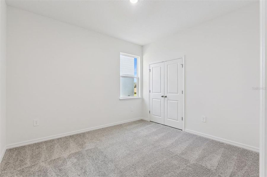 Spacious, unfurnished interior of a new home in Estes Reserve, Eustis (Image 16).