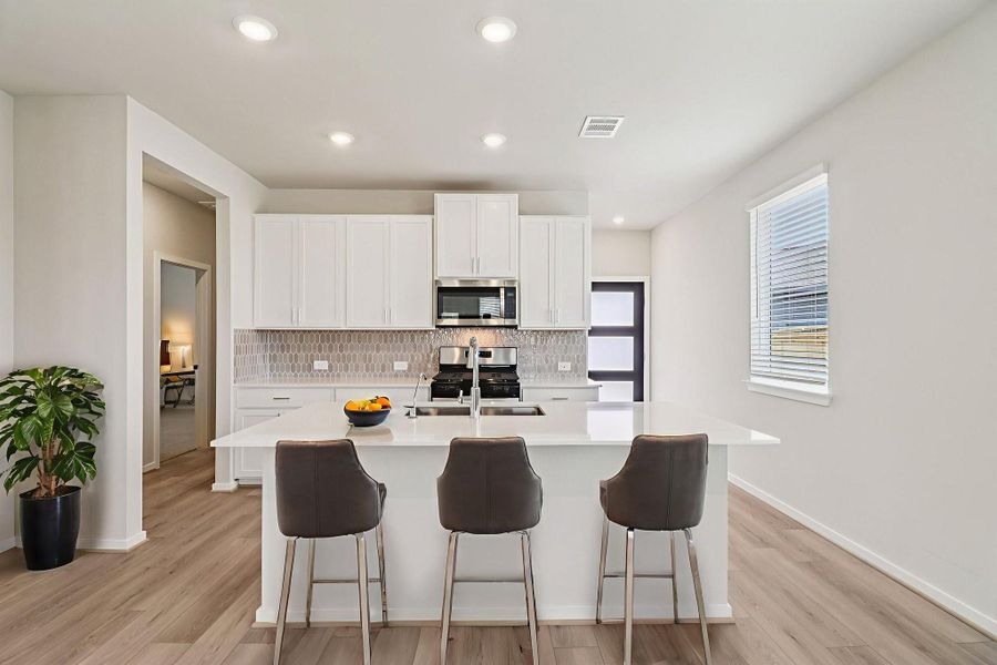 Photo is not of the actual home, but is an inspirational photo of builder’s model home and may depict options, furnishings, and/or decorator features that are not included