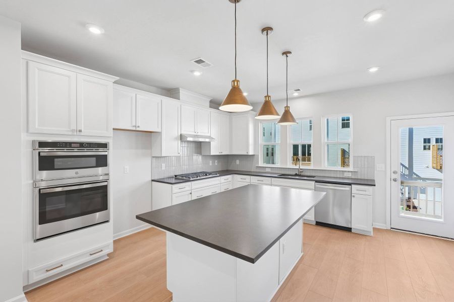 Representative furnished interior of a home built from the Nola by Tri Pointe Homes in Twinleaf Townes, Chapel Hill (Image 7).