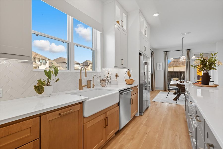 Lots of countertop space with beautiful farmhouse sink. Lots of countertop space with beautiful farmhouse sink.