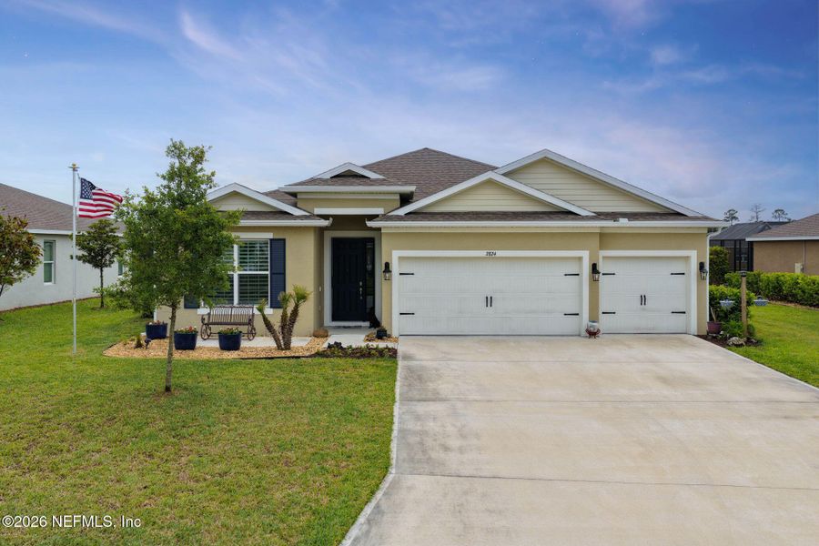 Front exterior of a new home in , Ormond Beach, FL, highlighting curb appeal (Image 21). Front exterior of a new home in , Ormond Beach, FL, highlighting curb appeal (Image 21).