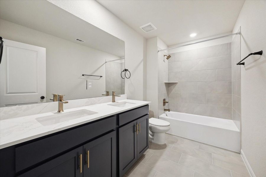 Furnished interior view inside a new home in Elyson, Katy (Image 17).