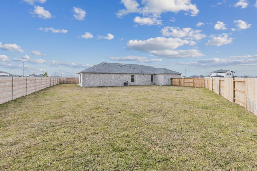 Exterior details and patio area of a home in River Ranch, Dayton (Image 3).
