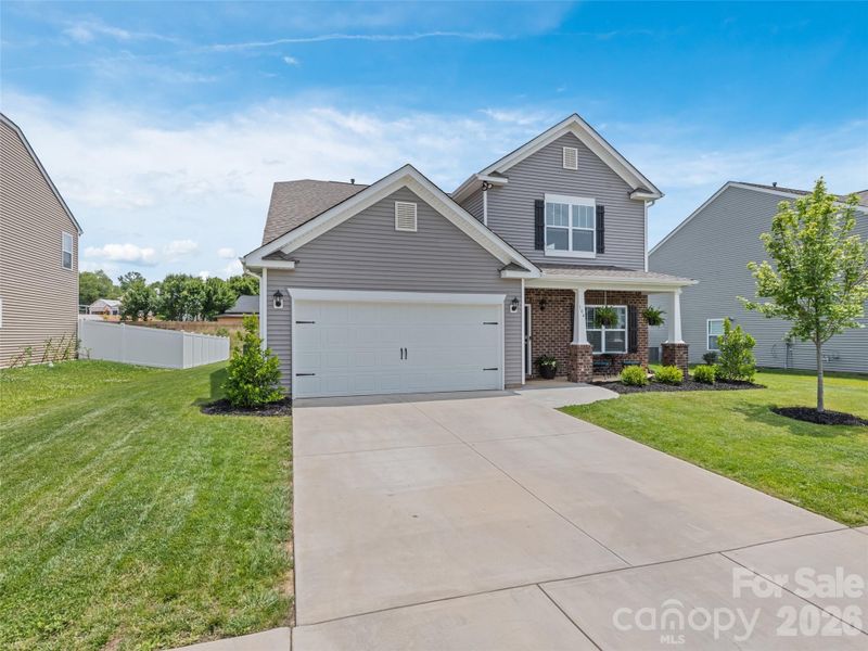 Front exterior of a new home in , Fletcher, NC, highlighting curb appeal (Image 21). Front exterior of a new home in , Fletcher, NC, highlighting curb appeal (Image 21).