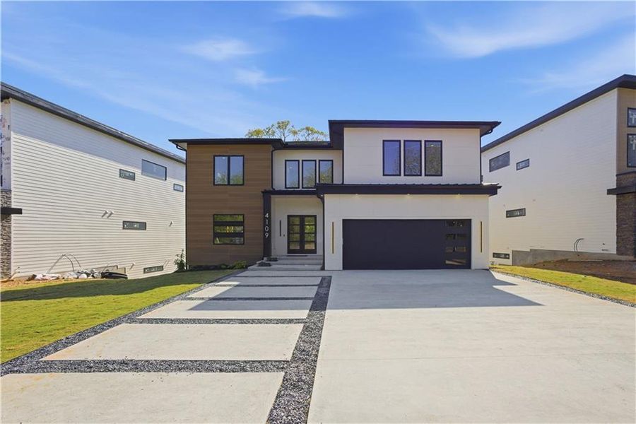 Front exterior of a new home in , Duluth, GA, highlighting curb appeal (Image 31).