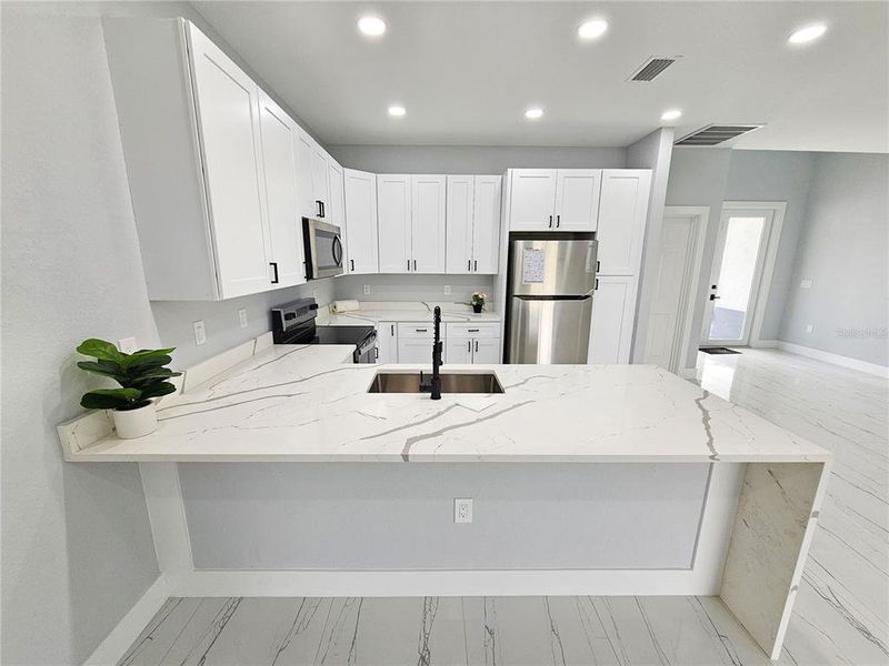 Furnished interior view inside a new home in , Lehigh Acres (Image 9).