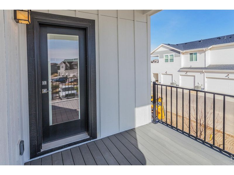 Exterior details and patio area of a home in Raindance Condos, Windsor (Image 19).