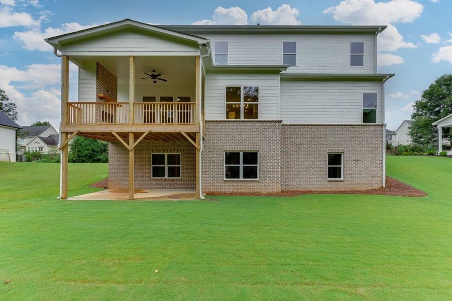 Front exterior of a new home in , Sugar Hill, GA, highlighting curb appeal (Image 2). Front exterior of a new home in , Sugar Hill, GA, highlighting curb appeal (Image 2).