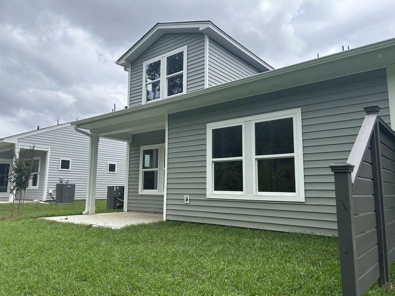 Front exterior of a new home in Hammock Walk at Nexton, Summerville, SC, highlighting curb appeal (Image 21). Front exterior of a new home in Hammock Walk at Nexton, Summerville, SC, highlighting curb appeal (Image 21).