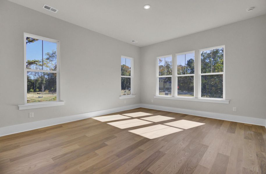 Spacious, unfurnished interior of a new home in Indigo Grove Single Family Homes, Johns Island (Image 33).
