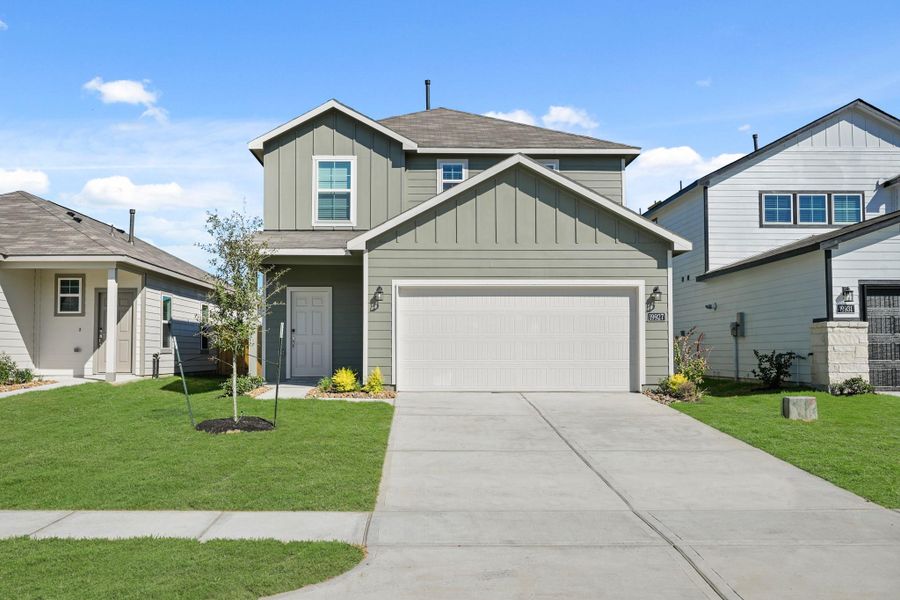 Front exterior of a new home in Northpark South, Porter, TX, highlighting curb appeal (Image 1). Front exterior of a new home in Northpark South, Porter, TX, highlighting curb appeal (Image 1).