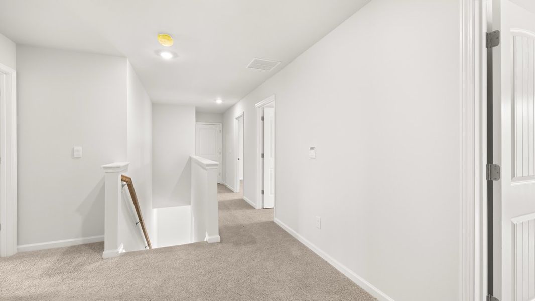 Representative unfurnished interior of a home built from the Galen by D.R. Horton in South Wind, South Fulton (Image 23).