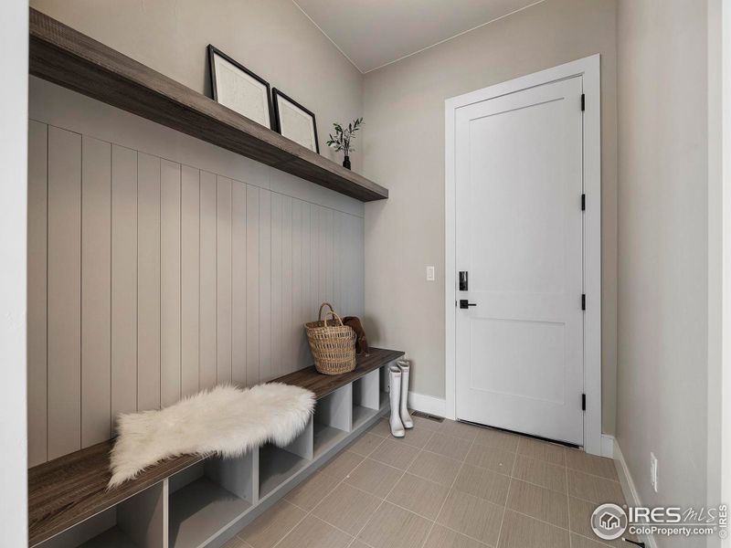 Mud room with built- drop zone and cubbies