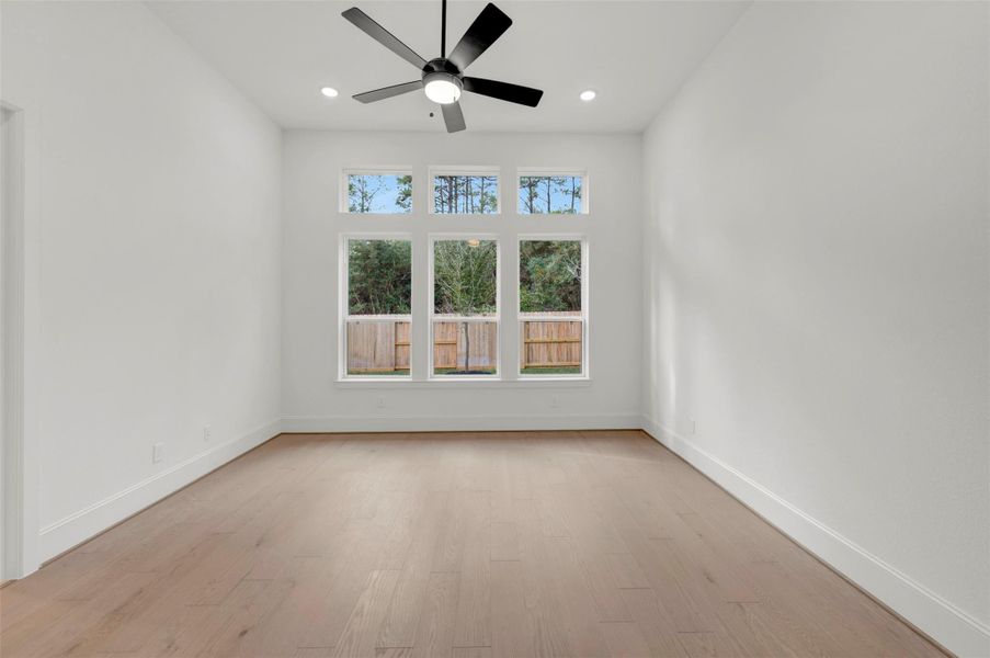 Spacious, unfurnished interior of a new home in The Woodlands Hills - Premier Collection, Willis (Image 26).