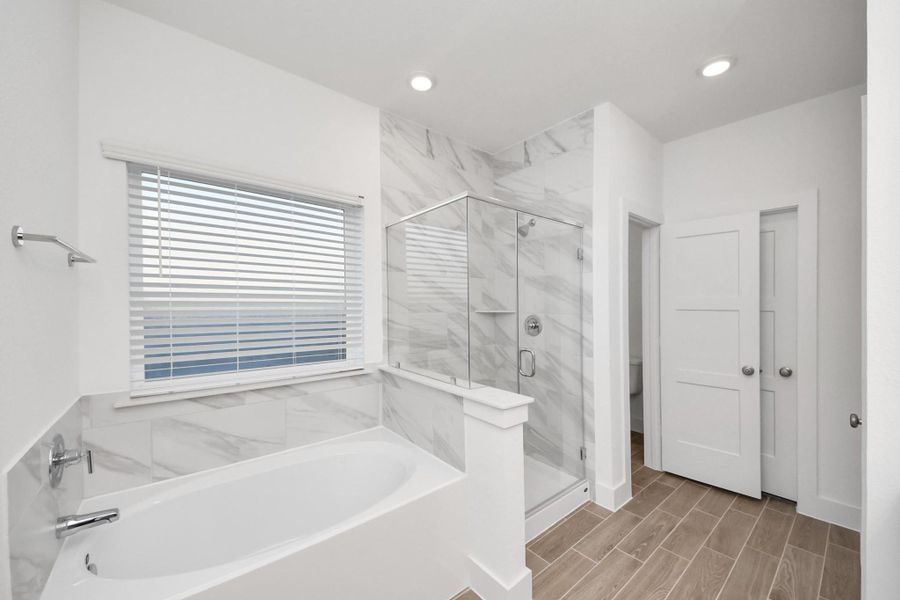 Furnished interior view inside a new home in Sunterra: Landmark Collection, Katy (Image 14).