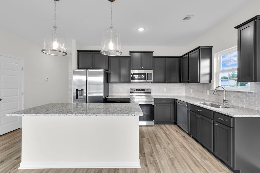Representative furnished interior of a home built from the The Trask by RTS Homes in Tibet Road at Sassafras, Allenhurst (Image 6).