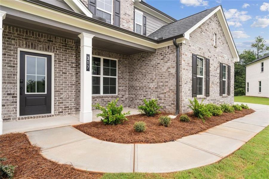 Exterior details and patio area of a home in Windsong Estates, McDonough (Image 21). Exterior details and patio area of a home in Windsong Estates, McDonough (Image 21).