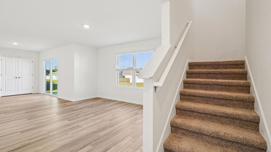Representative unfurnished interior of a home built from the Ensley by D.R. Horton in Sandal Key, Weeki Wachee (Image 21).