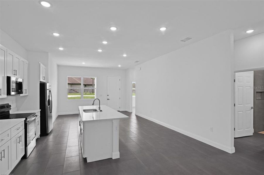 Furnished interior view inside a new home in , Dunnellon (Image 9).