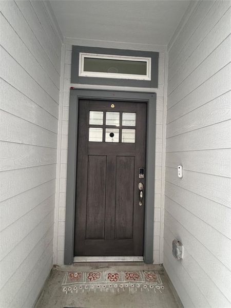 Exterior details and patio area of a home in Dunvale Village - Townhome Collection, Houston (Image 3).