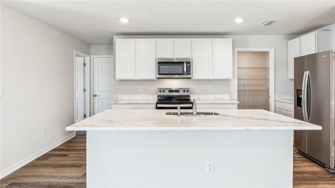 Furnished interior view inside a new home in Seaire, Parrish (Image 16).