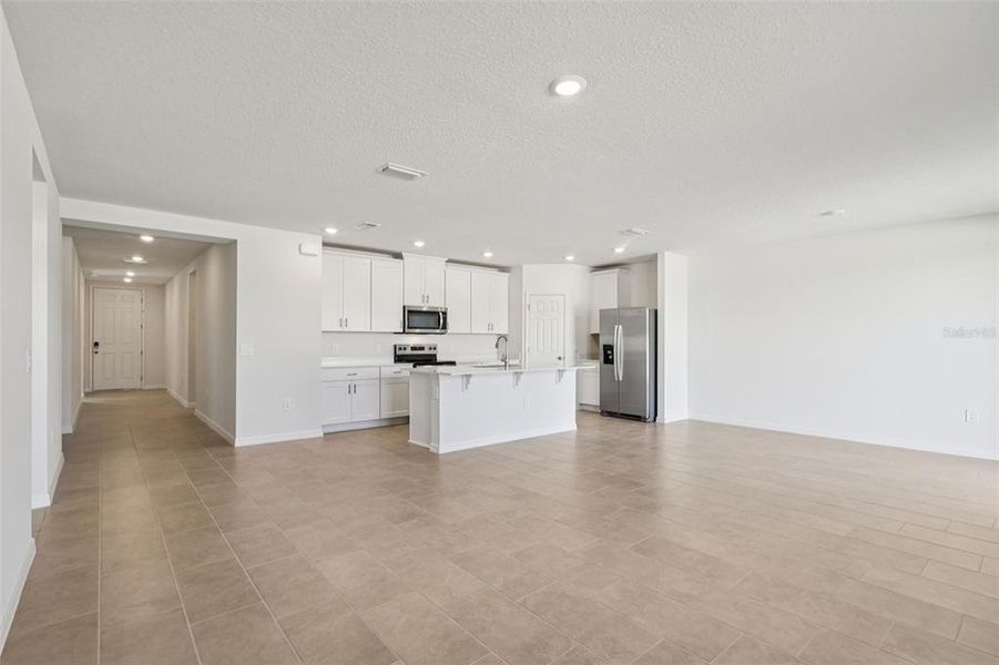 Spacious, unfurnished interior of a new home in Bradbury Creek - Signature Series, Haines City (Image 32).