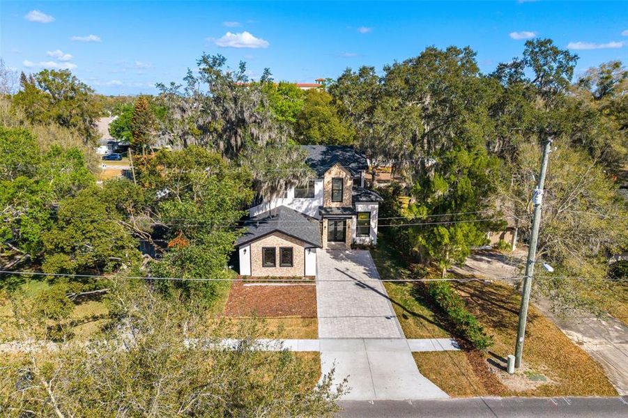 Front exterior of a new home in , Winter Park, FL, highlighting curb appeal (Image 26).
