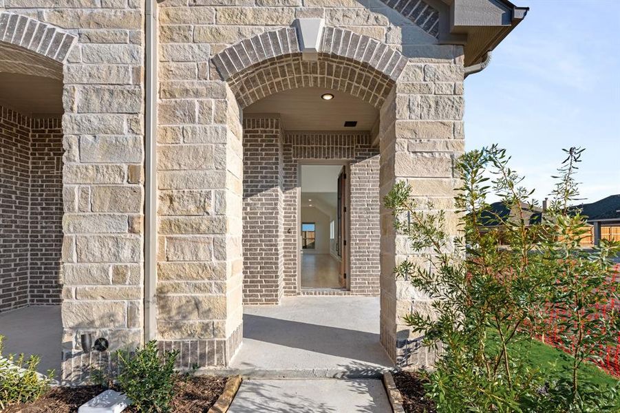 Exterior details and patio area of a home in Stone River Glen 50s, Royse City (Image 3).
