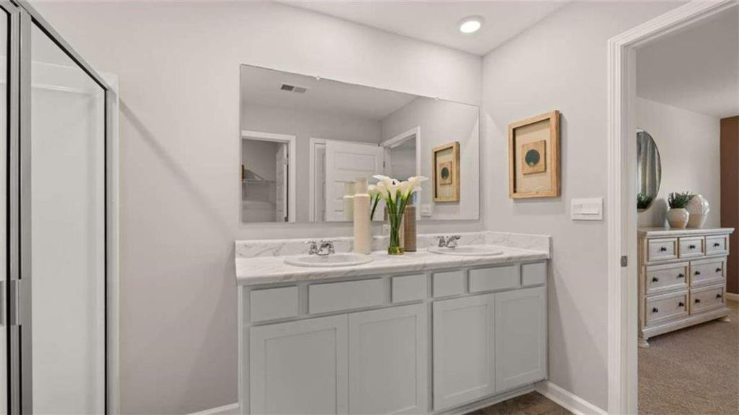 Furnished interior view inside a new home in Oakchase at Hampton, Hampton (Image 24).