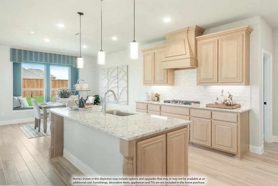 Kitchen with light wood cabinets, granite island, pendant lights, and open dining area with backyard view. Kitchen with light wood cabinets, granite island, pendant lights, and open dining area with backyard view.