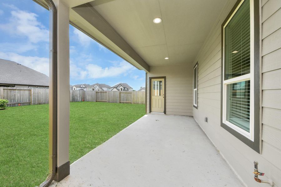 Experience outdoor living at its finest on this expansive covered patio, thoughtfully designed for BBQs and delightful outdoor dining. Experience outdoor living at its finest on this expansive covered patio, thoughtfully designed for BBQs and delightful outdoor dining.