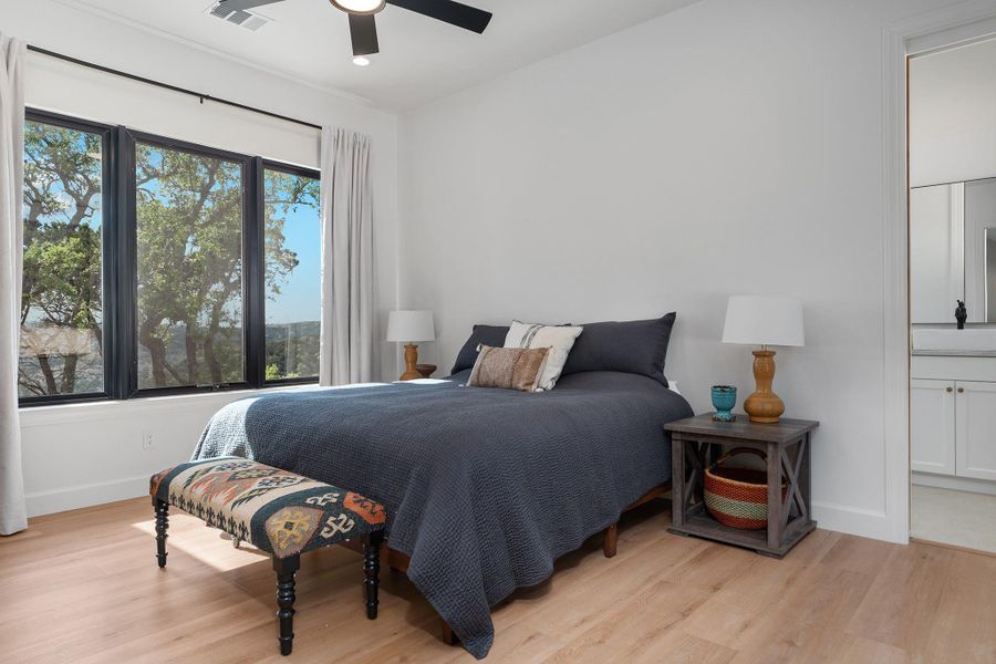 This is a TO BE BUILT custom home on 6.75 acres in Rainbow Ranch, Wimberley TX.