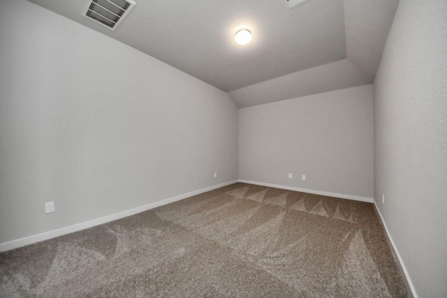 Come upstairs and enjoy a movie night with your friends and family in this spacious media room! Sample photo of completed home with similar floor plan. Actual colors and selections may vary. Come upstairs and enjoy a movie night with your friends and family in this spacious media room! Sample photo of completed home with similar floor plan. Actual colors and selections may vary.