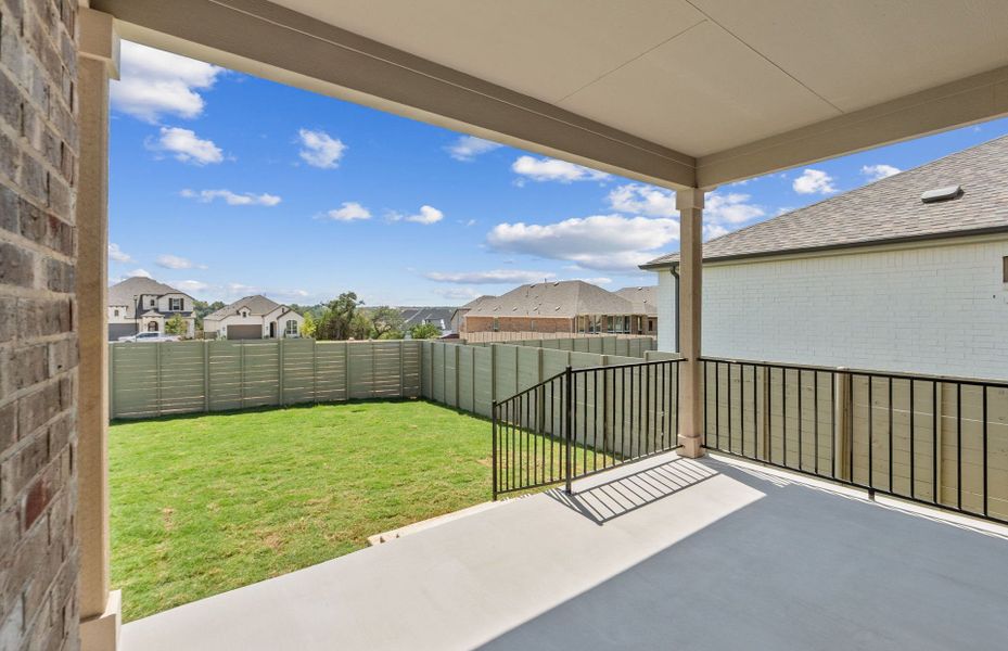 Exterior details and patio area of a home in Wolf Ranch, Georgetown (Image 22).