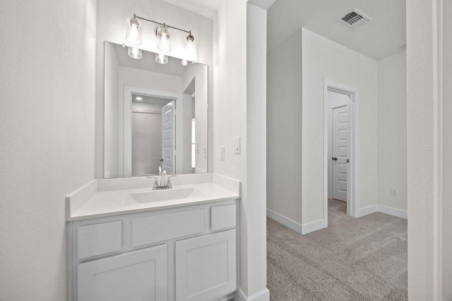 Furnished interior view inside a new home in Parmer Ranch - 60', Georgetown (Image 13). Furnished interior view inside a new home in Parmer Ranch - 60', Georgetown (Image 13).