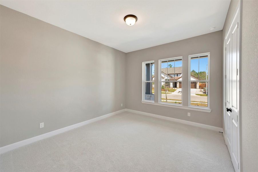 Guest suite at first floor with big windows, oversized closet and en-suite bath with walk-in shower